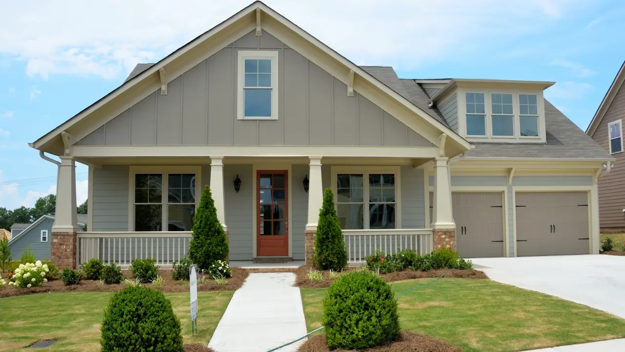 blue bowl of black bean beef tortilla soup on a board with cilantro and shredded cheese in background
